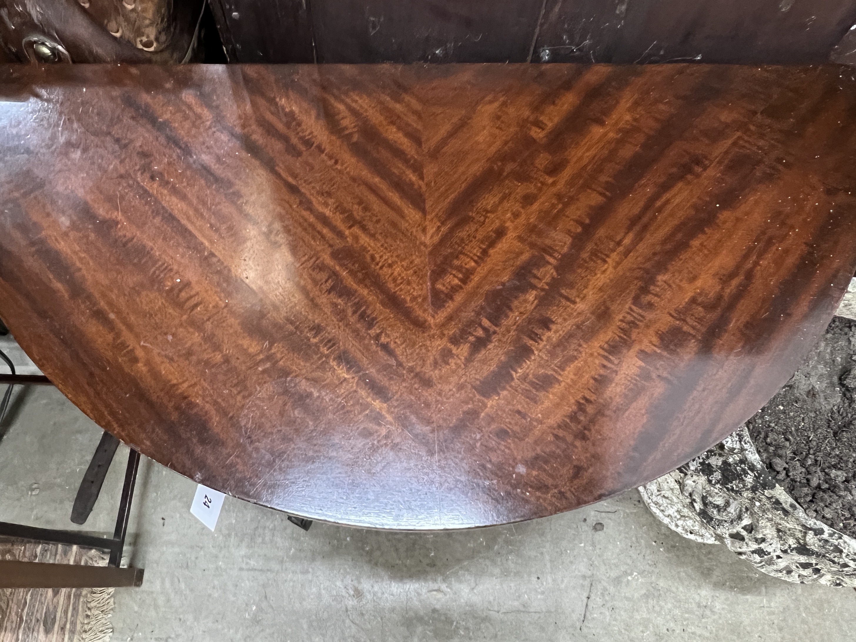 A Chippendale revival mahogany demi lune folding card table, width 92cm, depth 46cm, height 77cm